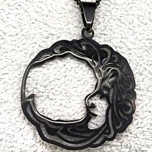 Man in the moon necklace